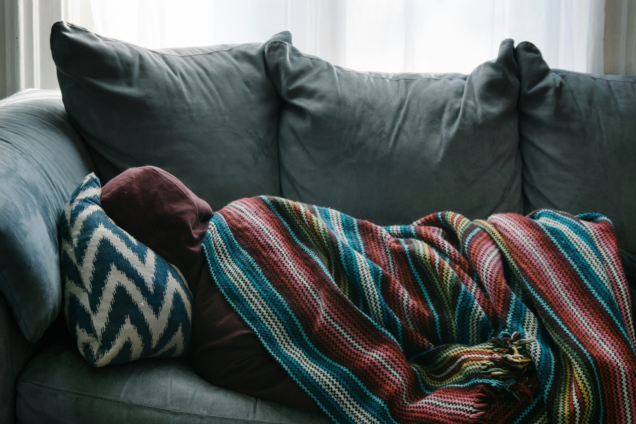 Unwell patient resting after receiving treatment